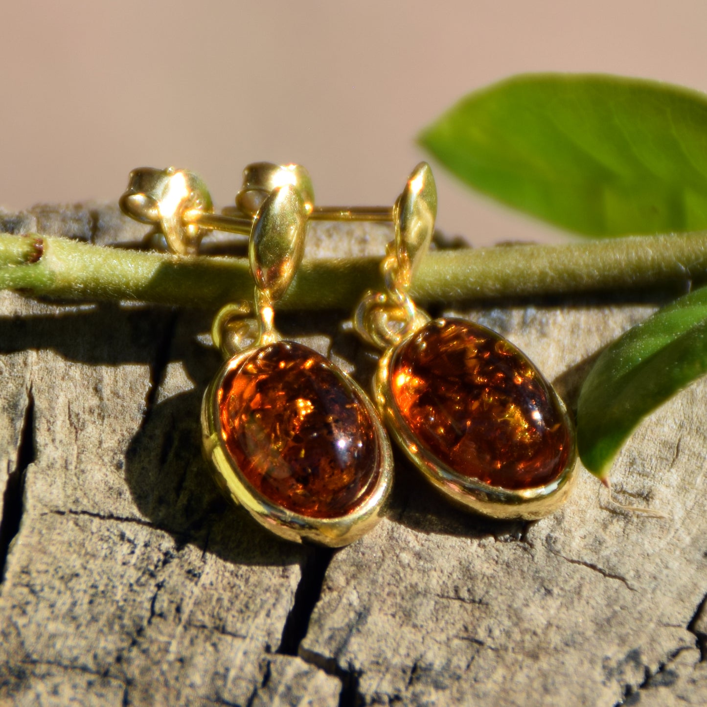 Elegant oval earrings in natural cognac Amber and 18k Gold plated 925 Sterling Silver, MJ Baltica, BZK171