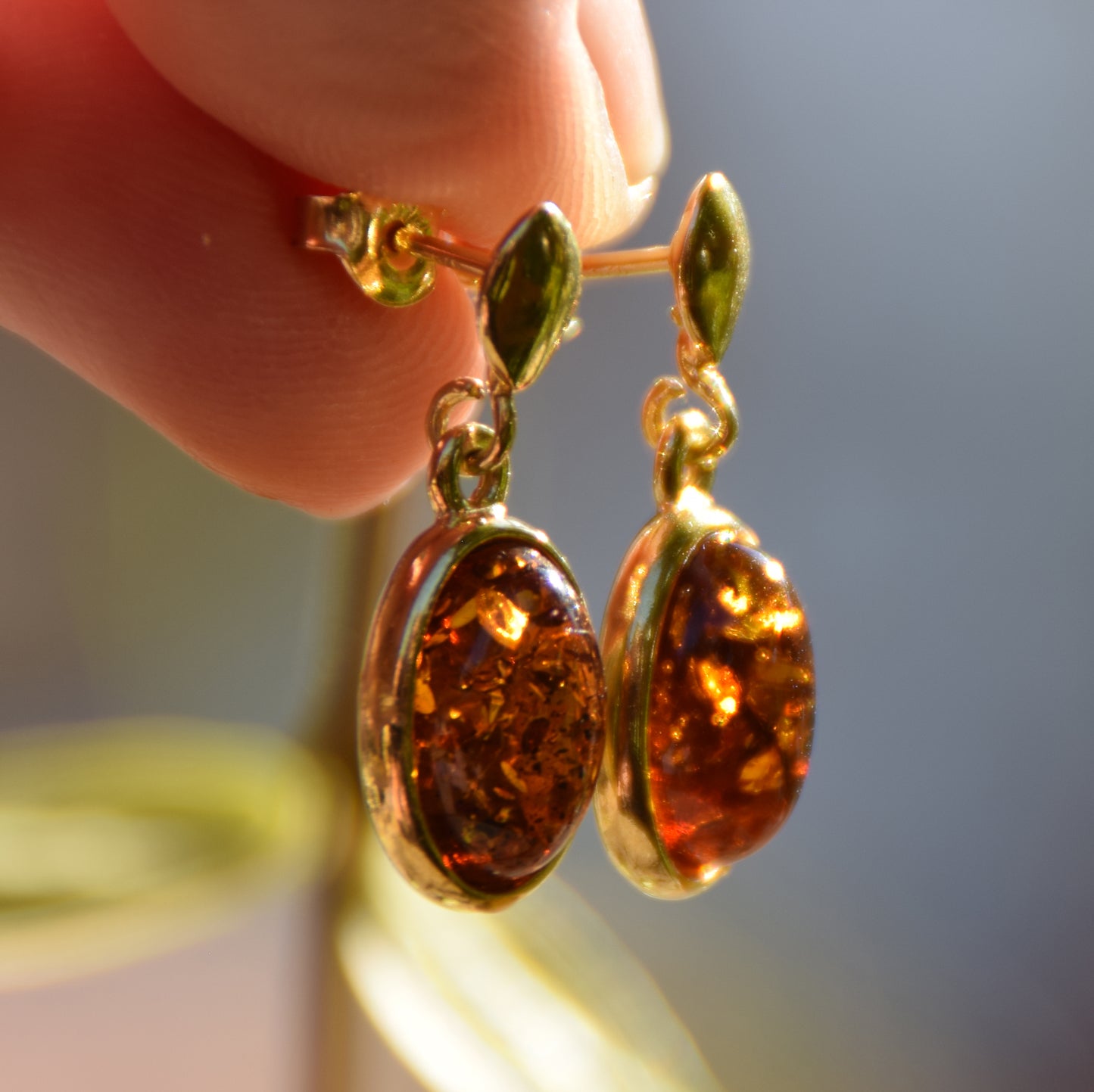 Elegant oval earrings in natural cognac Amber and 18k Gold plated 925 Sterling Silver, MJ Baltica, BZK171