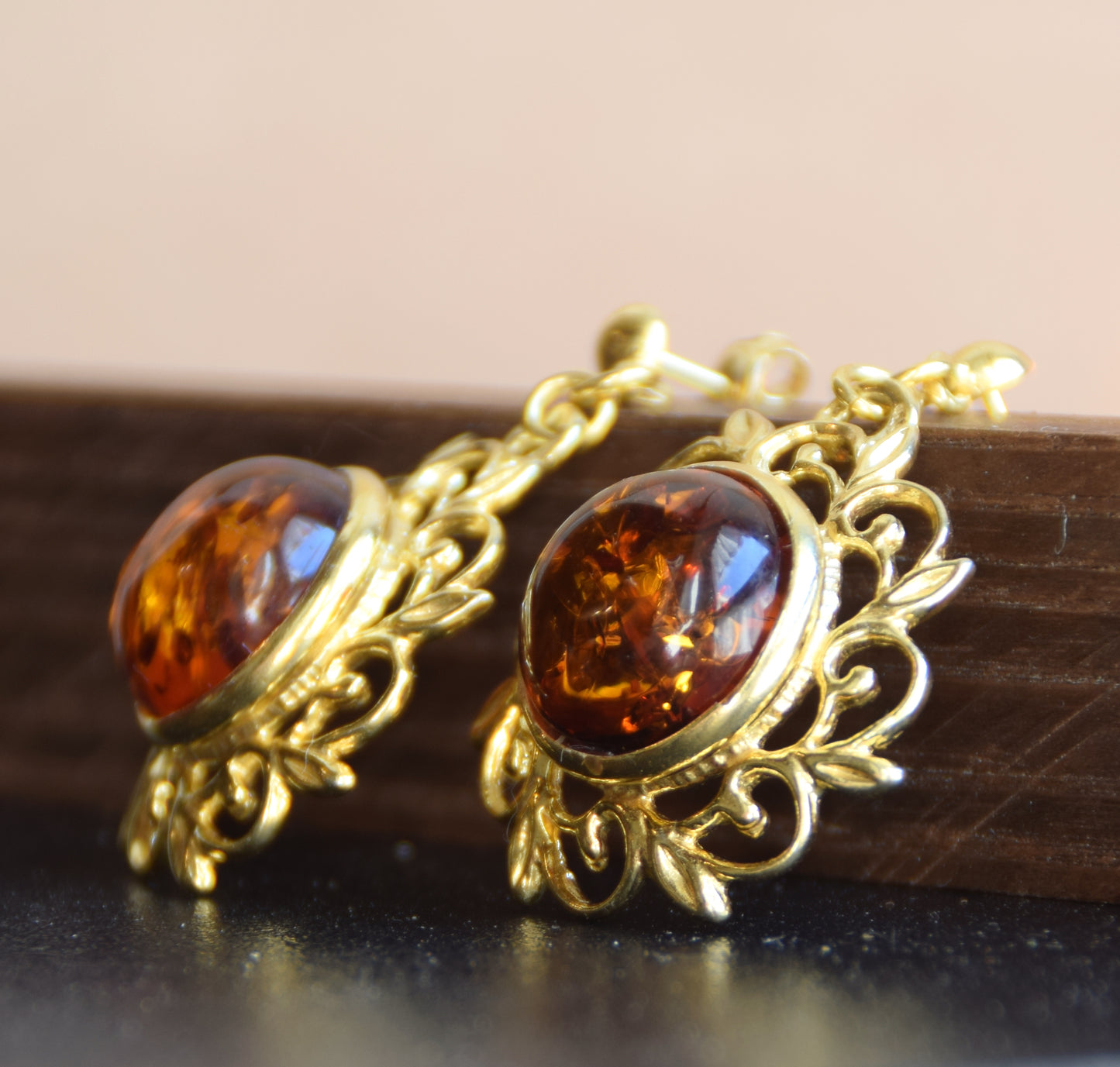 Elegant round floral earrings crafted from natural cognac amber and 18k gold-plated 925 sterling silver, MJ Baltica, BZK180