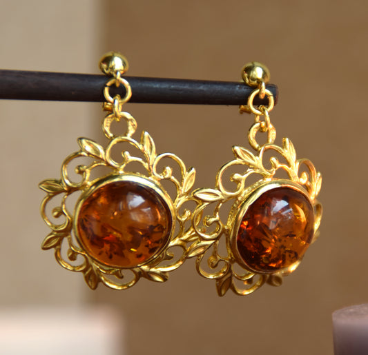 Elegant round floral earrings crafted from natural cognac amber and 18k gold-plated 925 sterling silver, MJ Baltica, BZK180