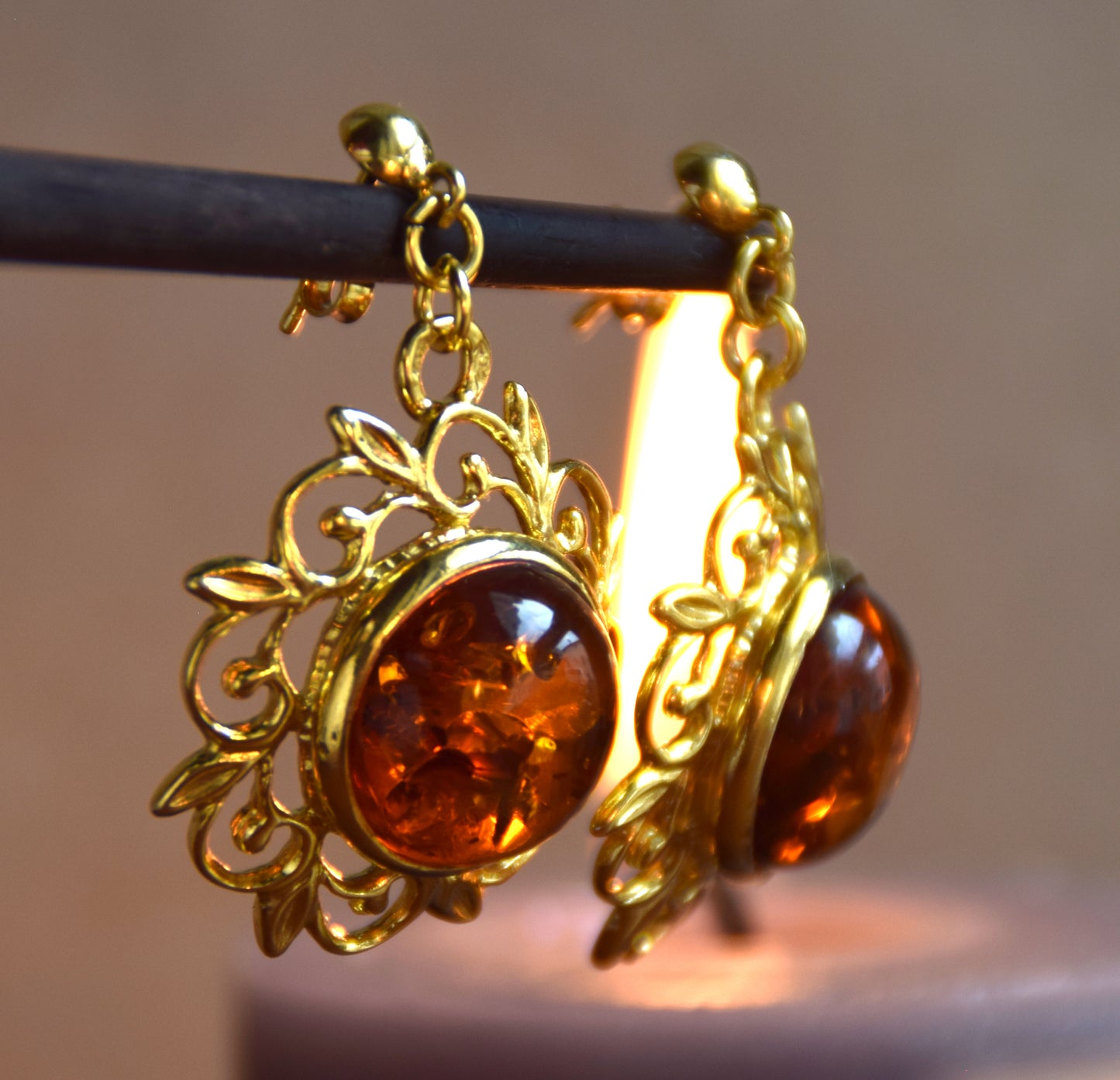 Elegant round floral earrings crafted from natural cognac amber and 18k gold-plated 925 sterling silver, MJ Baltica, BZK180