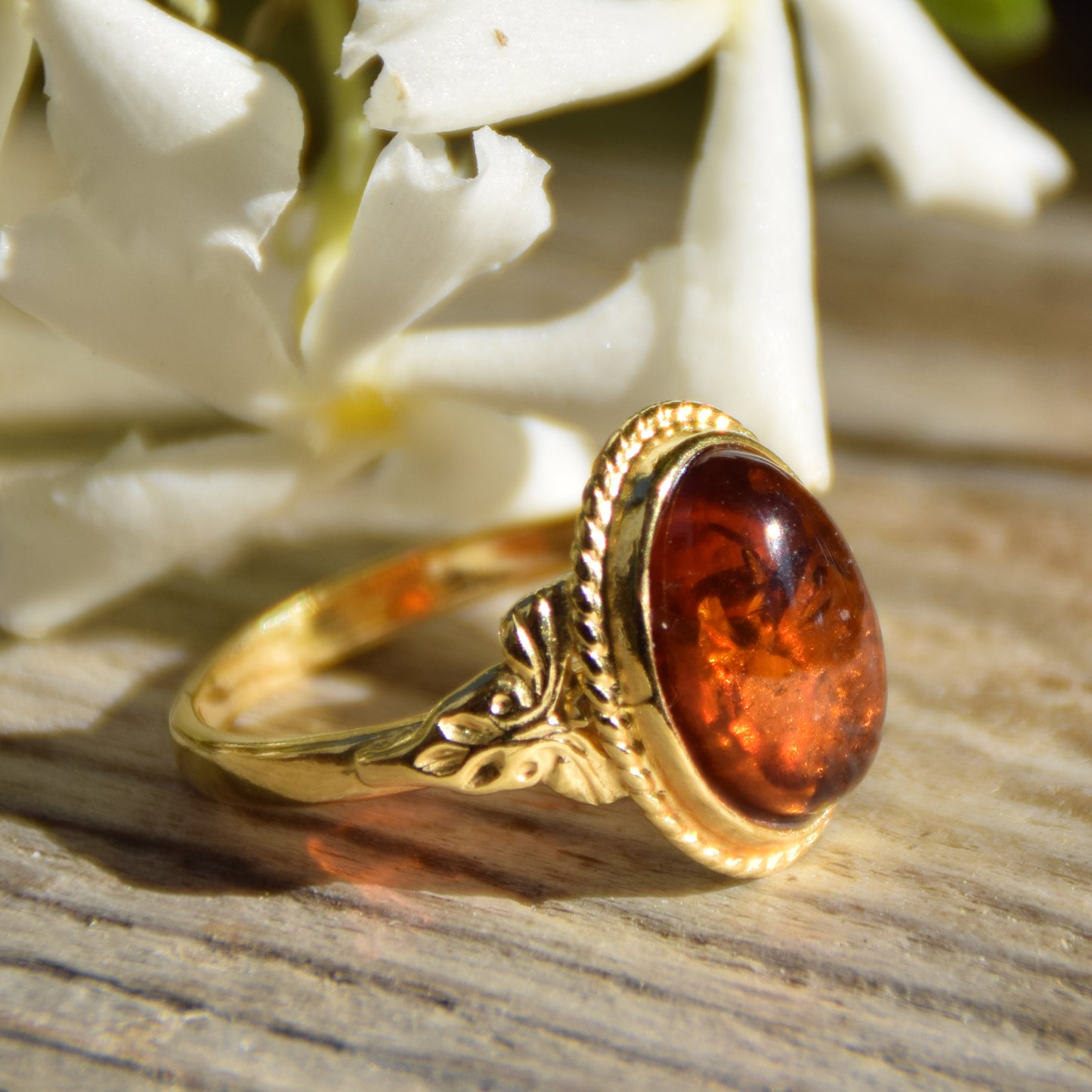 Classic oval ring in vintage style made with natural cognac-colored Amber and 18k Gold-plated Silver, MJ Baltica, BZP034