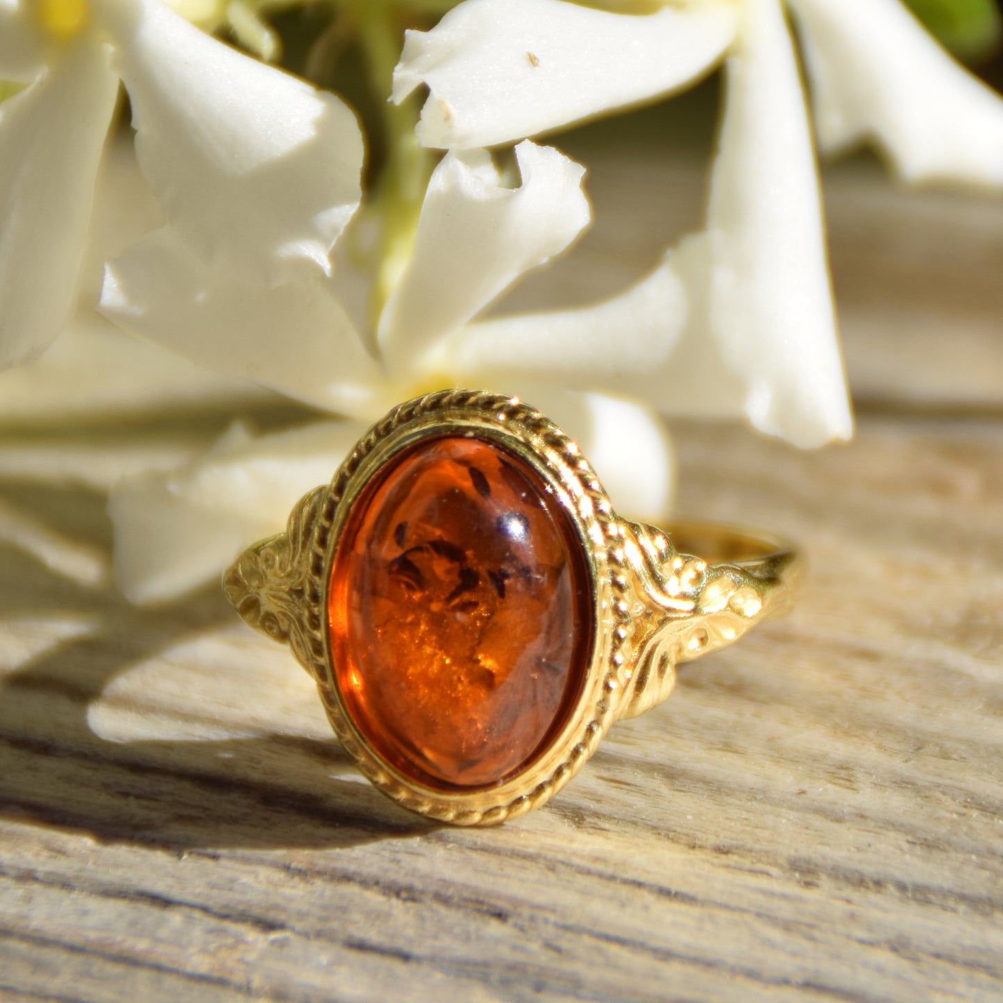 Classic oval ring in vintage style made with natural cognac-colored Amber and 18k Gold-plated Silver, MJ Baltica, BZP034