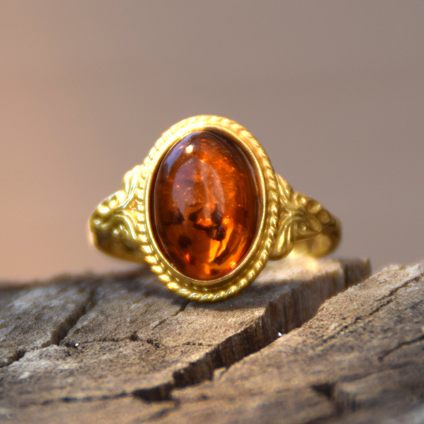 Classic oval ring in vintage style made with natural cognac-colored Amber and 18k Gold-plated Silver, MJ Baltica, BZP034