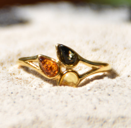 Delicate luminous floral-style ring created with natural Amber of various shades and 18k Gold plated Silver, MJ Baltica, BZP046