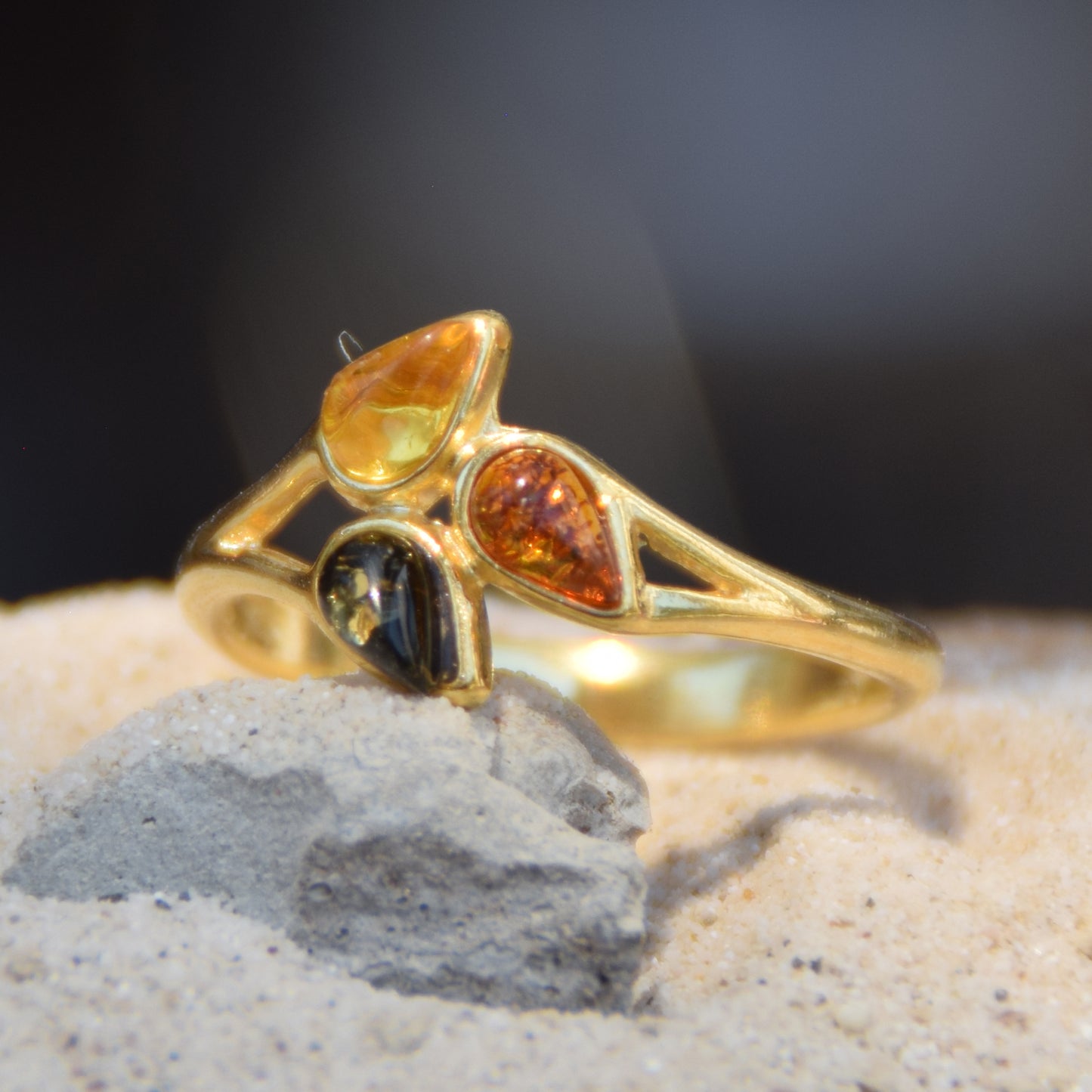 Delicate luminous floral-style ring created with natural Amber of various shades and 18k Gold plated Silver, MJ Baltica, BZP046