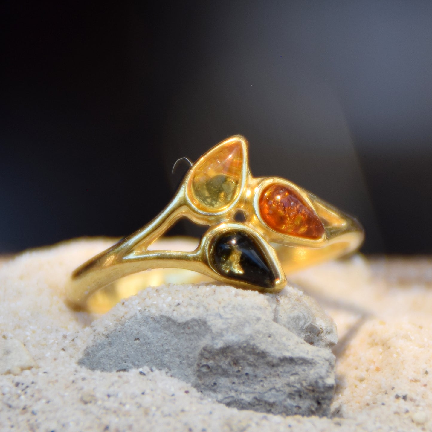 Delicate luminous floral-style ring created with natural Amber of various shades and 18k Gold plated Silver, MJ Baltica, BZP046