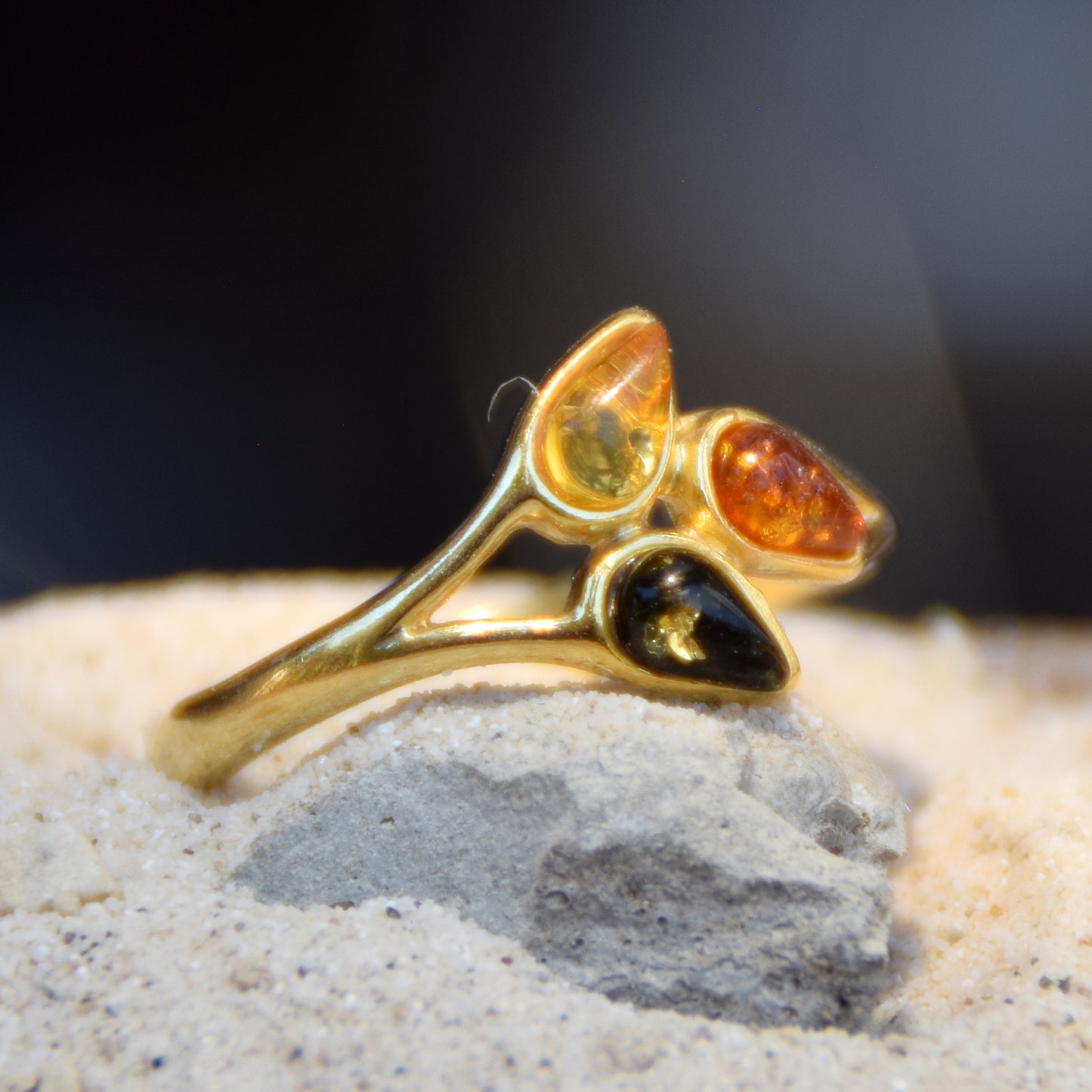 Delicate luminous floral-style ring created with natural Amber of various shades and 18k Gold plated Silver, MJ Baltica, BZP046