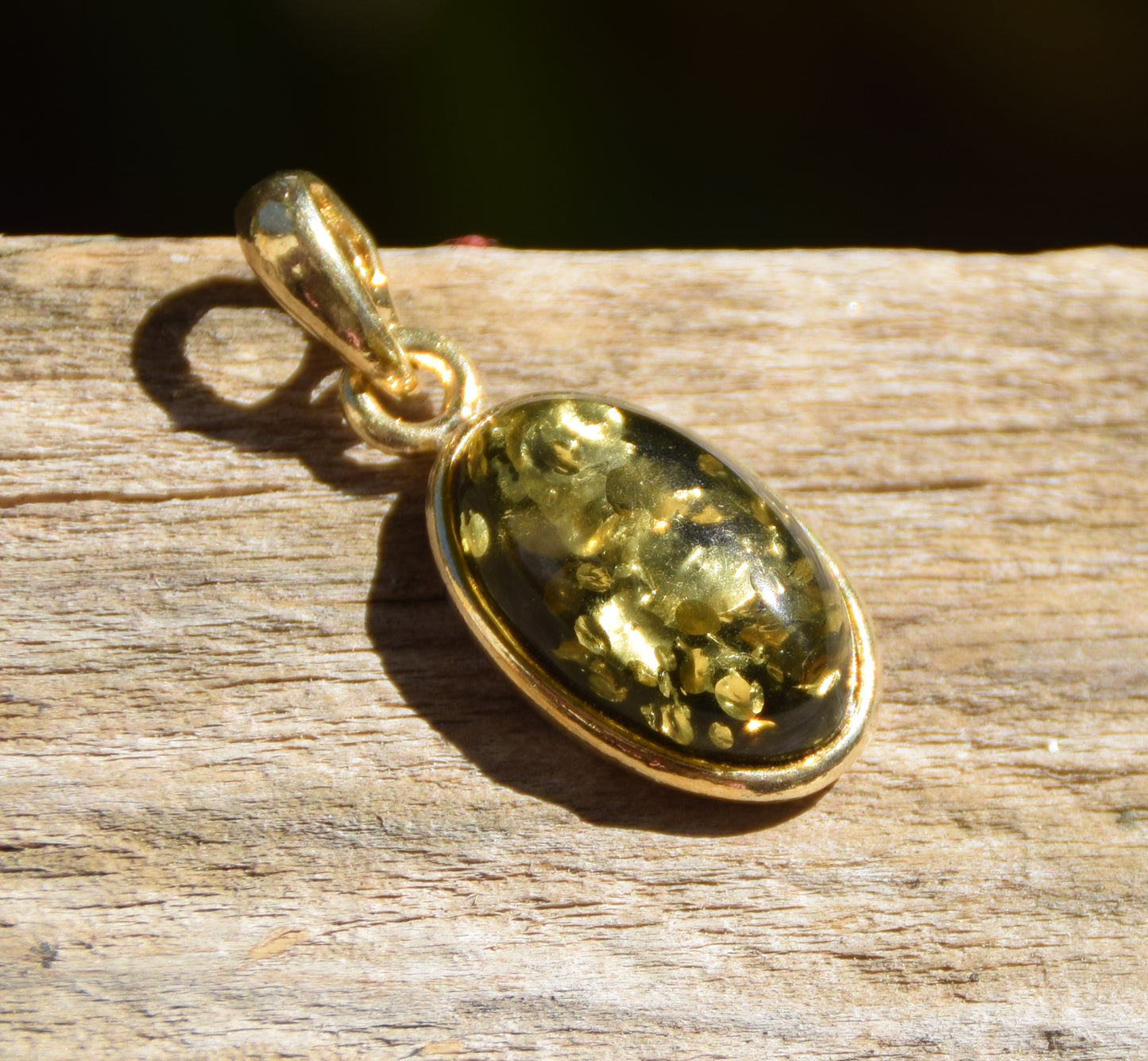 Classic oval pendant featuring natural green Amber and 18k Gold-plated Sterling Silver, MJ Baltica, BZW018