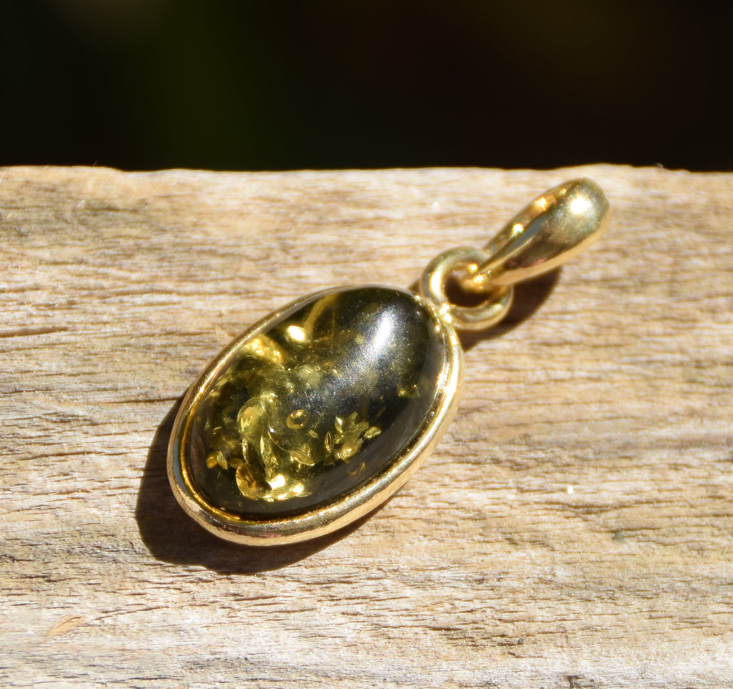 Classic oval pendant featuring natural green Amber and 18k Gold-plated Sterling Silver, MJ Baltica, BZW018