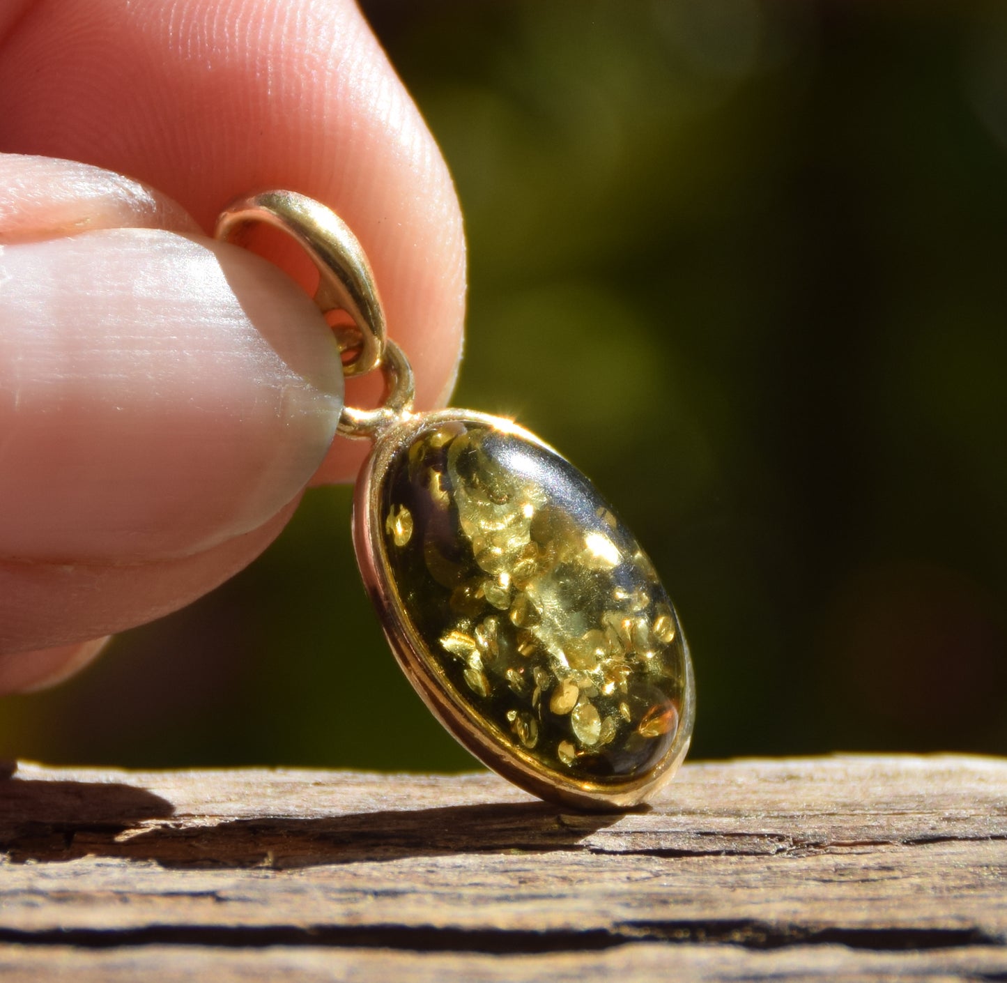 Classic oval pendant featuring natural green Amber and 18k Gold-plated Sterling Silver, MJ Baltica, BZW018