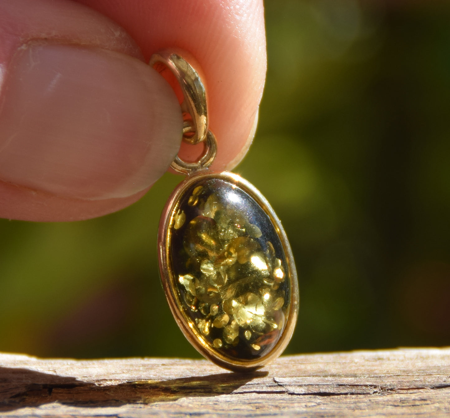 Classic oval pendant featuring natural green Amber and 18k Gold-plated Sterling Silver, MJ Baltica, BZW018