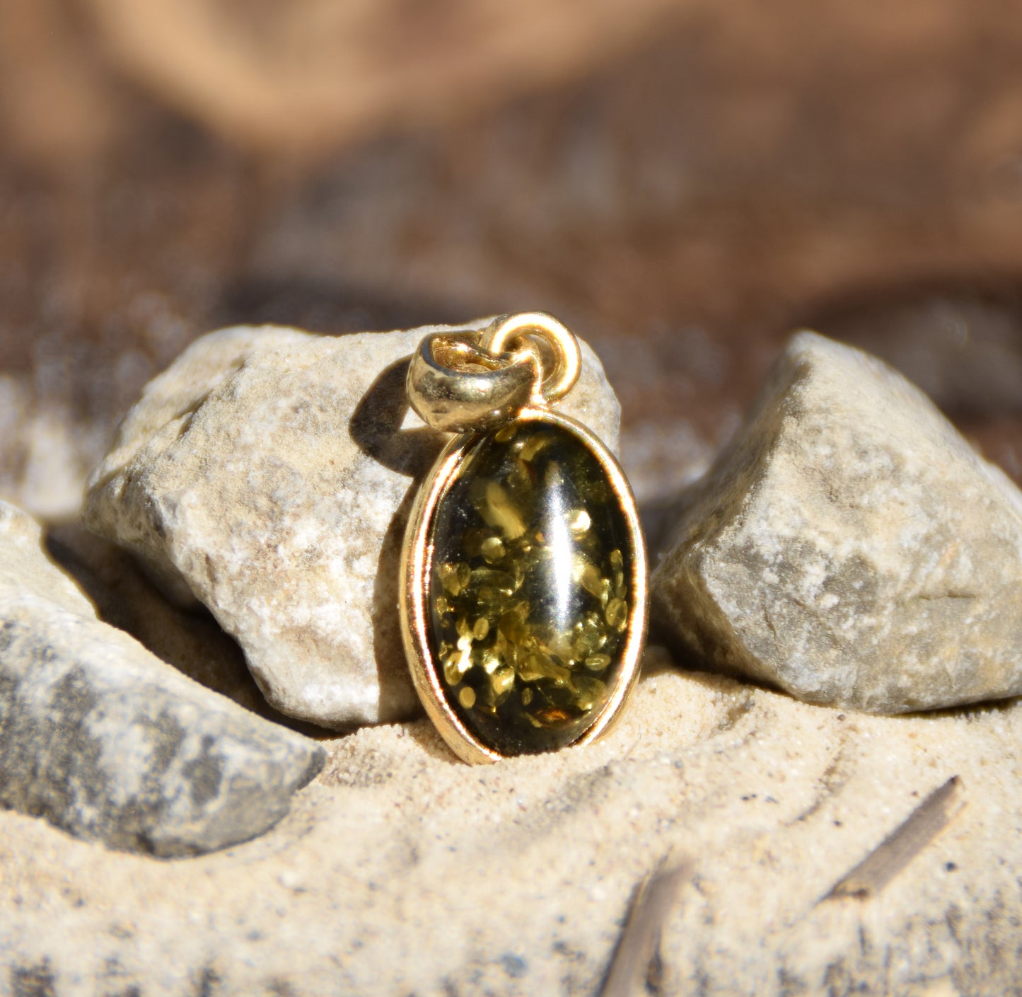 Classic oval pendant featuring natural green Amber and 18k Gold-plated Sterling Silver, MJ Baltica, BZW018
