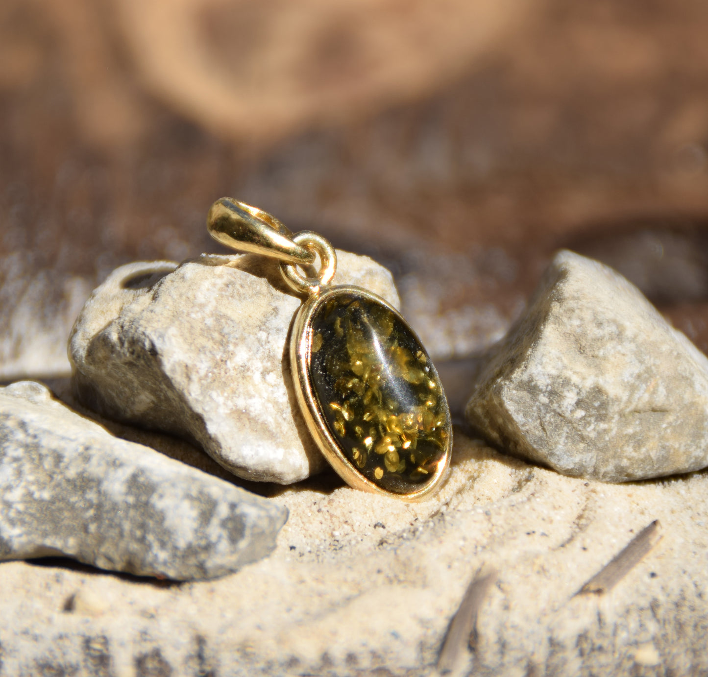 Classic oval pendant featuring natural green Amber and 18k Gold-plated Sterling Silver, MJ Baltica, BZW018