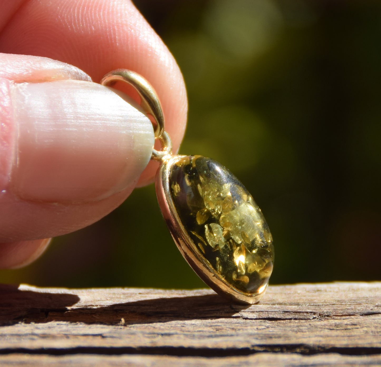 Classic oval pendant featuring natural green Amber and 18k Gold-plated Sterling Silver, MJ Baltica, BZW018