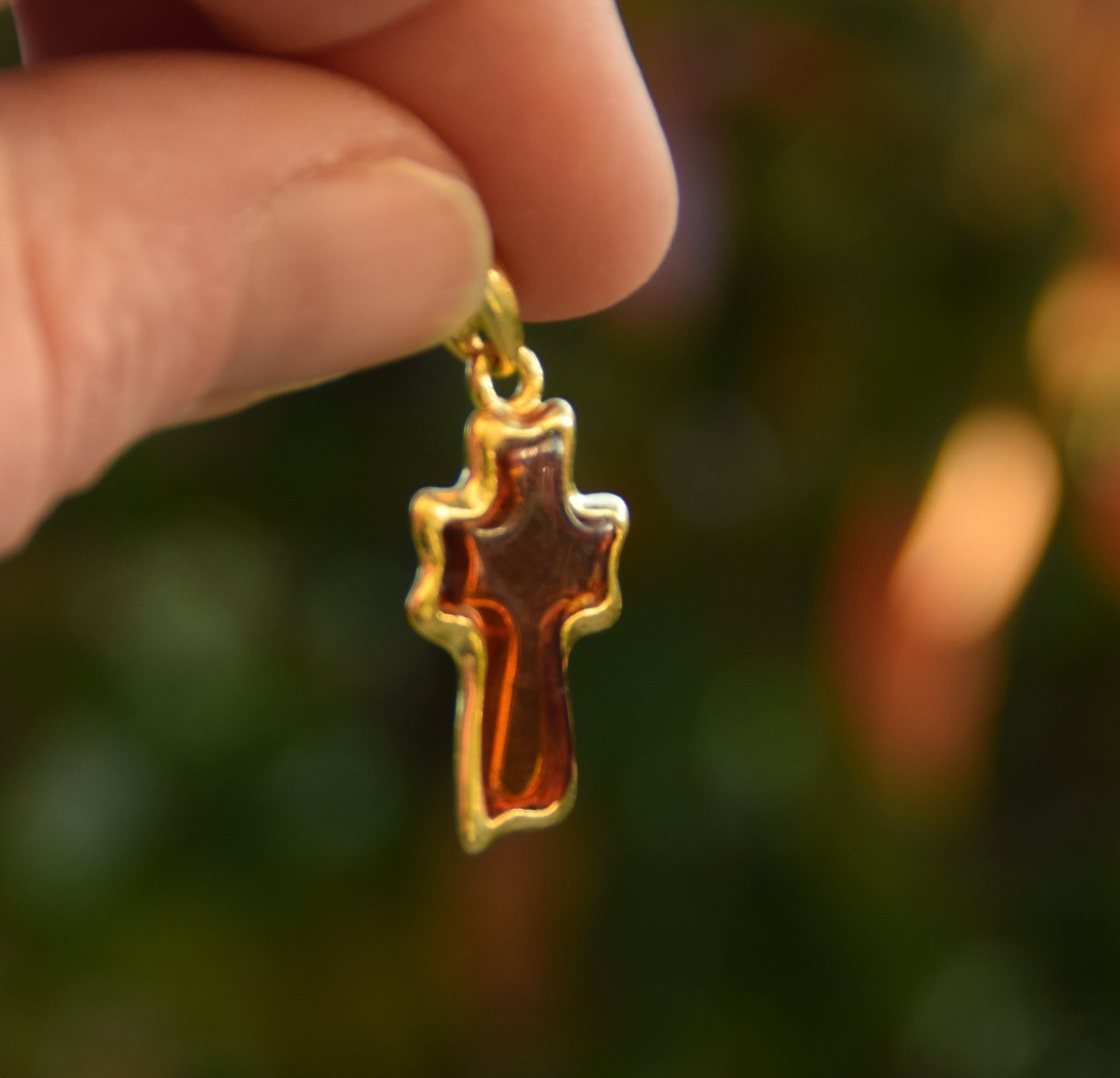 Cognac-colored natural amber carved cross pendant with 18k gold-plated 925 sterling silver, MJ Baltica, BZW056