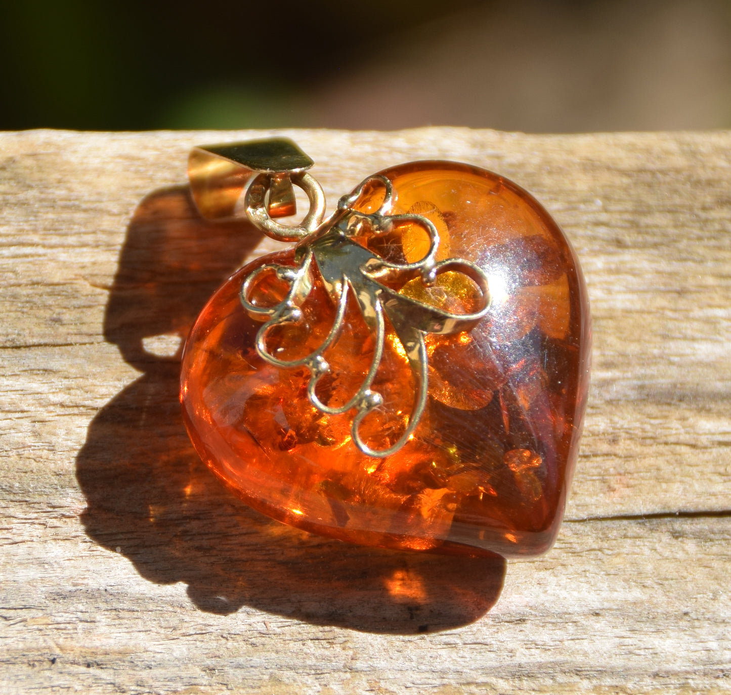 Romantic pendant with large cognac-colored natural amber heart and 18k gold-plated silver, MJ Baltica, BZW077