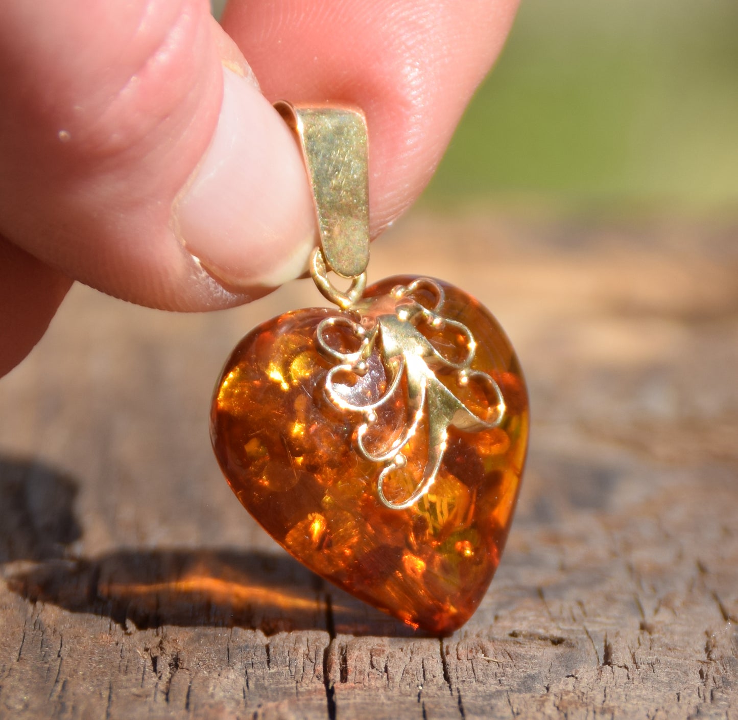 Romantic pendant with large cognac-colored natural amber heart and 18k gold-plated silver, MJ Baltica, BZW077