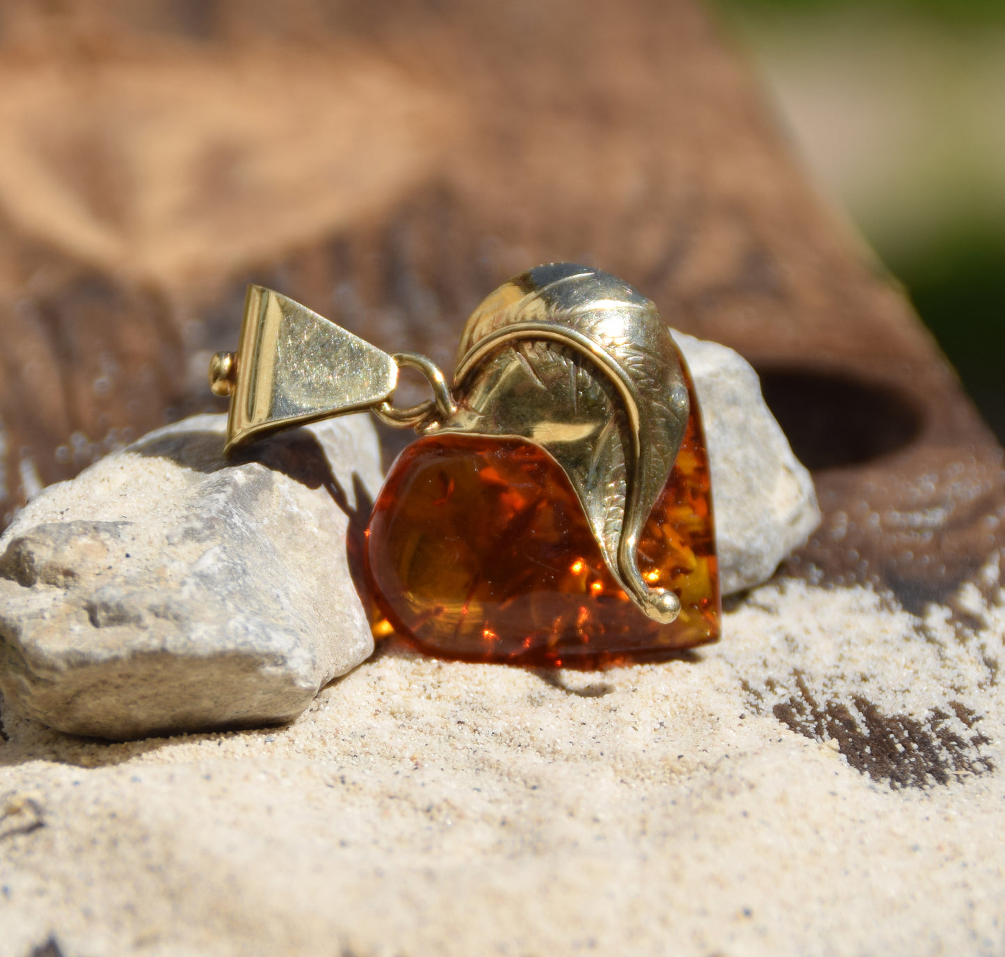 Romantic pendant with a large heart covered with natural cognac-colored Amber leaf and 18k Gold-plated Silver, MJ Baltica, BZW123