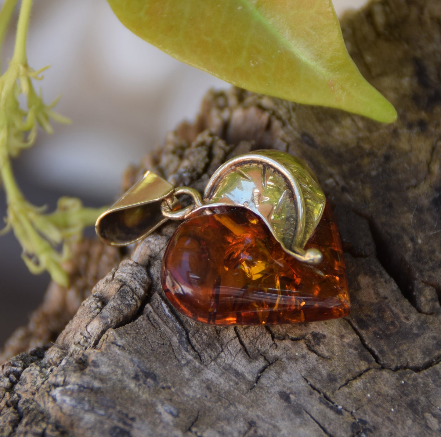 Romantic pendant with a large heart covered with natural cognac-colored Amber leaf and 18k Gold-plated Silver, MJ Baltica, BZW123