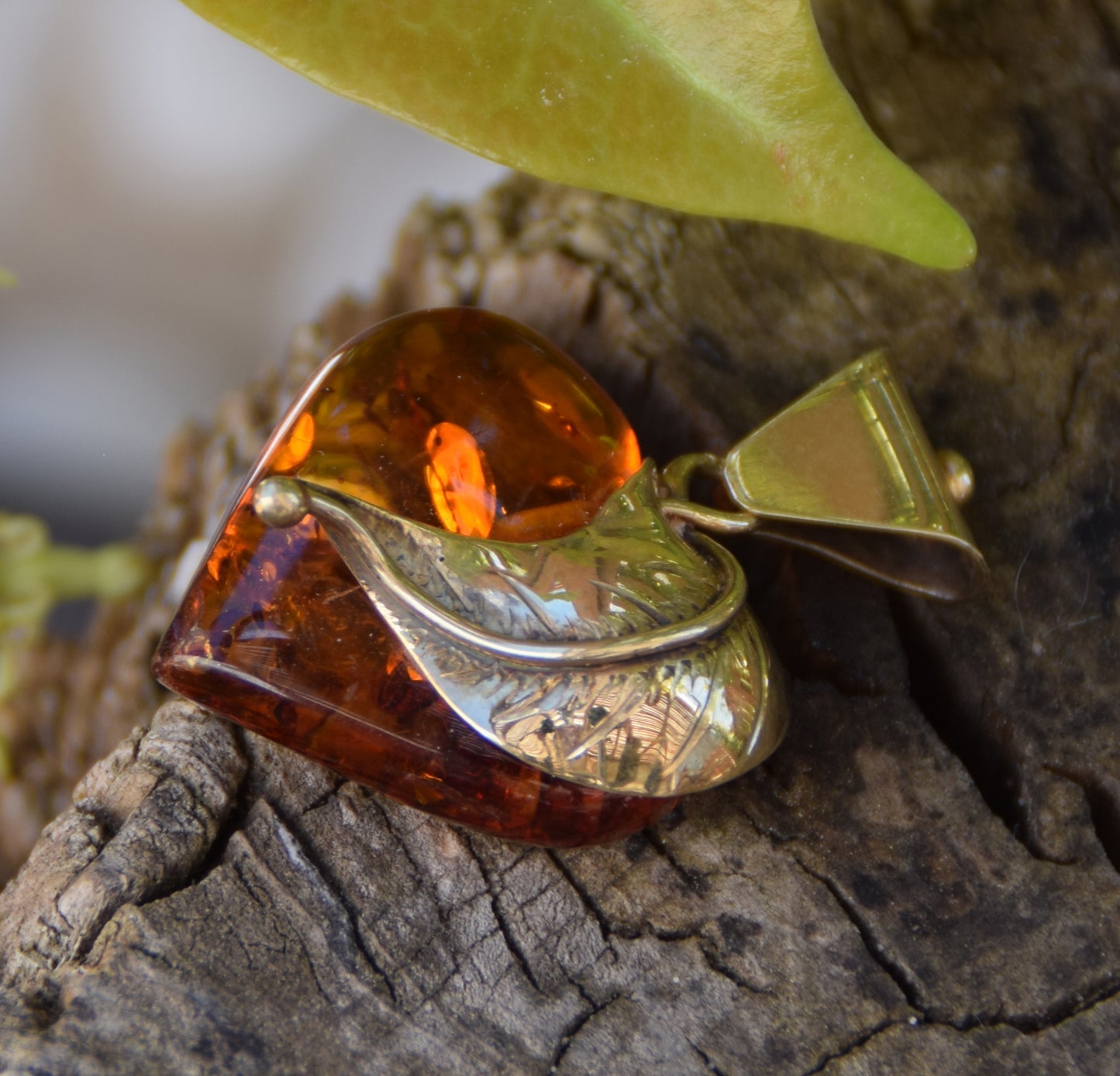 Romantic pendant with a large heart covered with natural cognac-colored Amber leaf and 18k Gold-plated Silver, MJ Baltica, BZW123