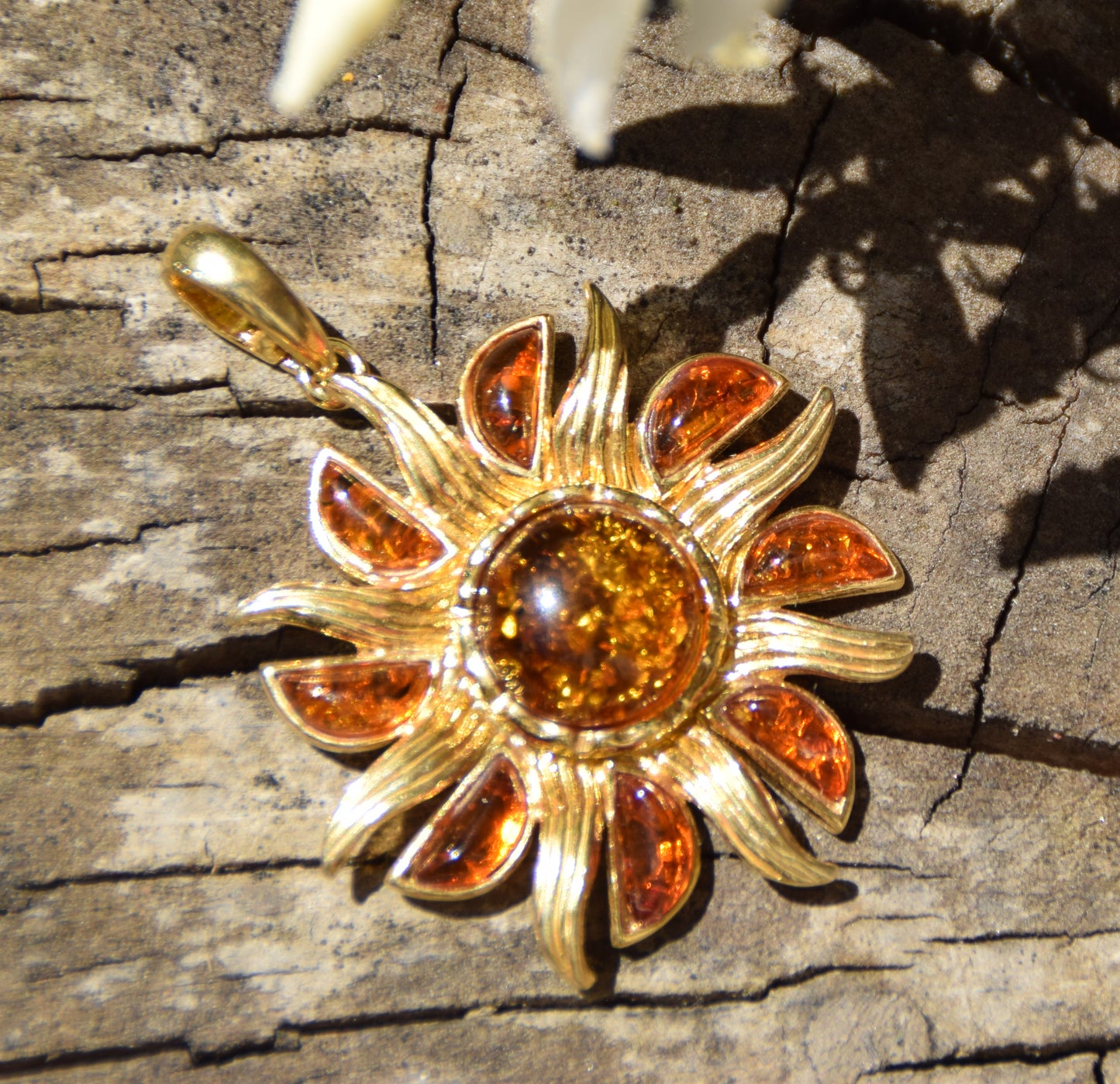 Bright pendant in the shape of a dainty sun in natural cognac Amber and 925 Sterling Silver, 14k Gold Plated, MJ Baltica, BZW140