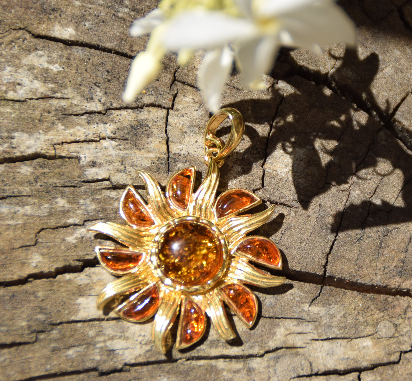 Bright pendant in the shape of a dainty sun in natural cognac Amber and 925 Sterling Silver, 14k Gold Plated, MJ Baltica, BZW140