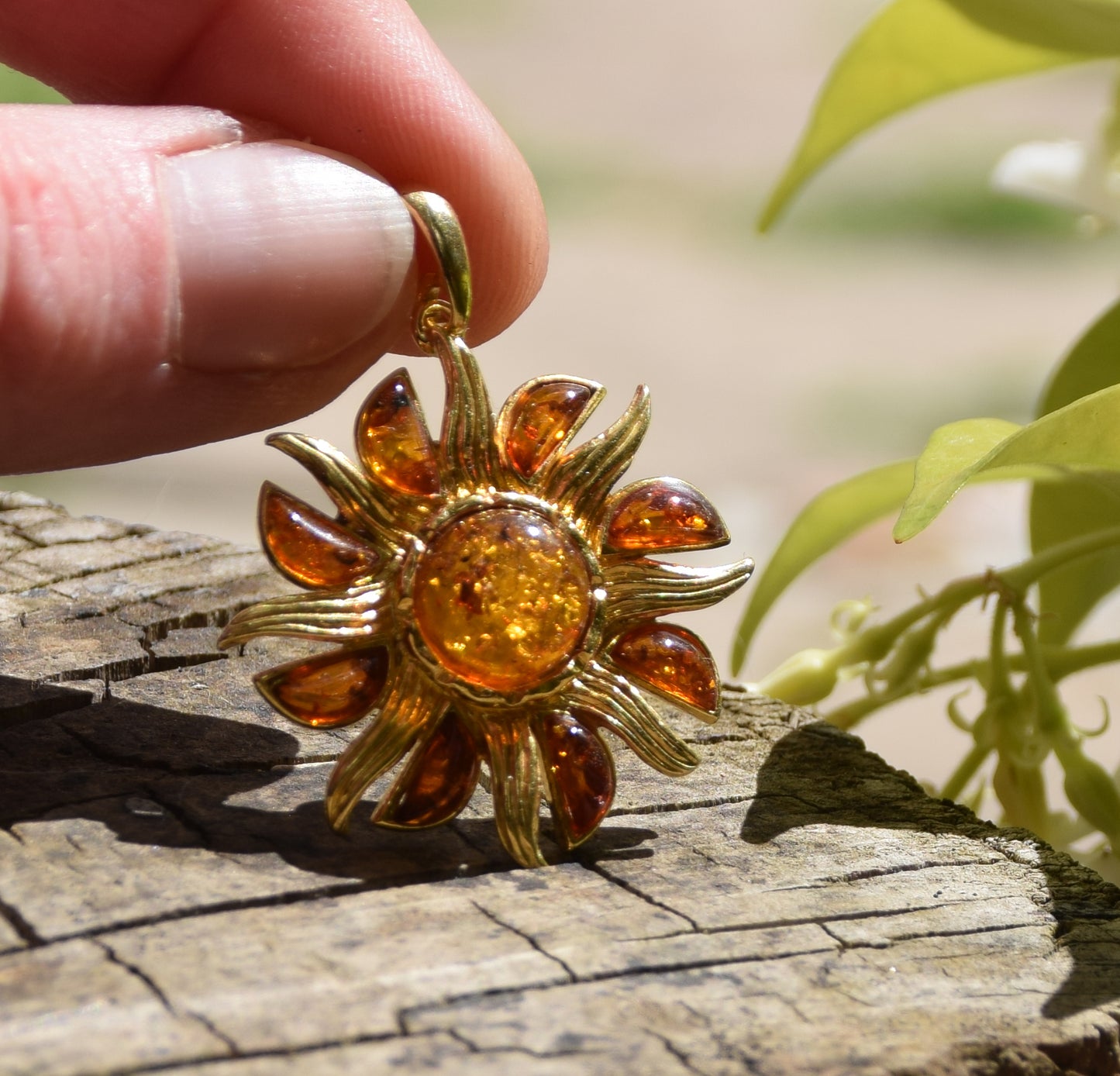Bright pendant in the shape of a dainty sun in natural cognac Amber and 925 Sterling Silver, 14k Gold Plated, MJ Baltica, BZW140