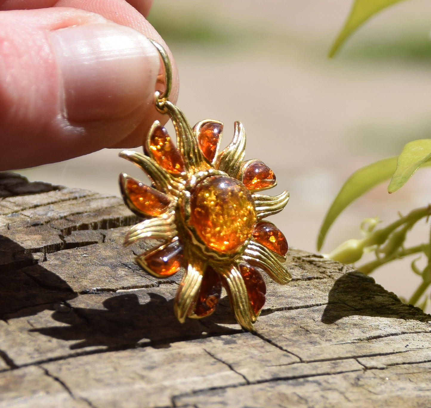 Bright pendant in the shape of a dainty sun in natural cognac Amber and 925 Sterling Silver, 14k Gold Plated, MJ Baltica, BZW140