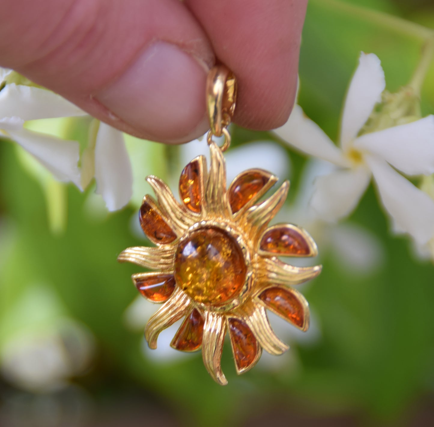 Bright pendant in the shape of a dainty sun in natural cognac Amber and 925 Sterling Silver, 14k Gold Plated, MJ Baltica, BZW140