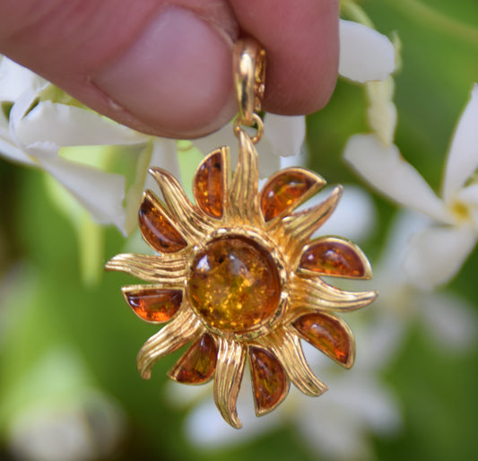Bright pendant in the shape of a dainty sun in natural cognac Amber and 925 Sterling Silver, 14k Gold Plated, MJ Baltica, BZW140