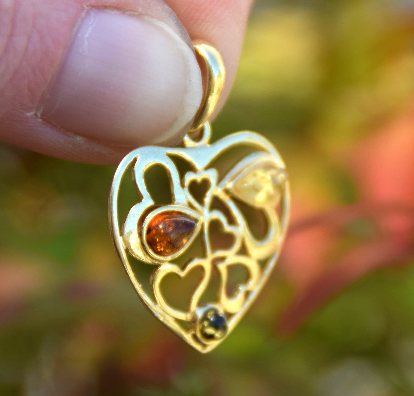 Romantic heart pendant in natural Amber of various shades and 18k Gold plated 925 Silver, MJ Baltica, BZW164