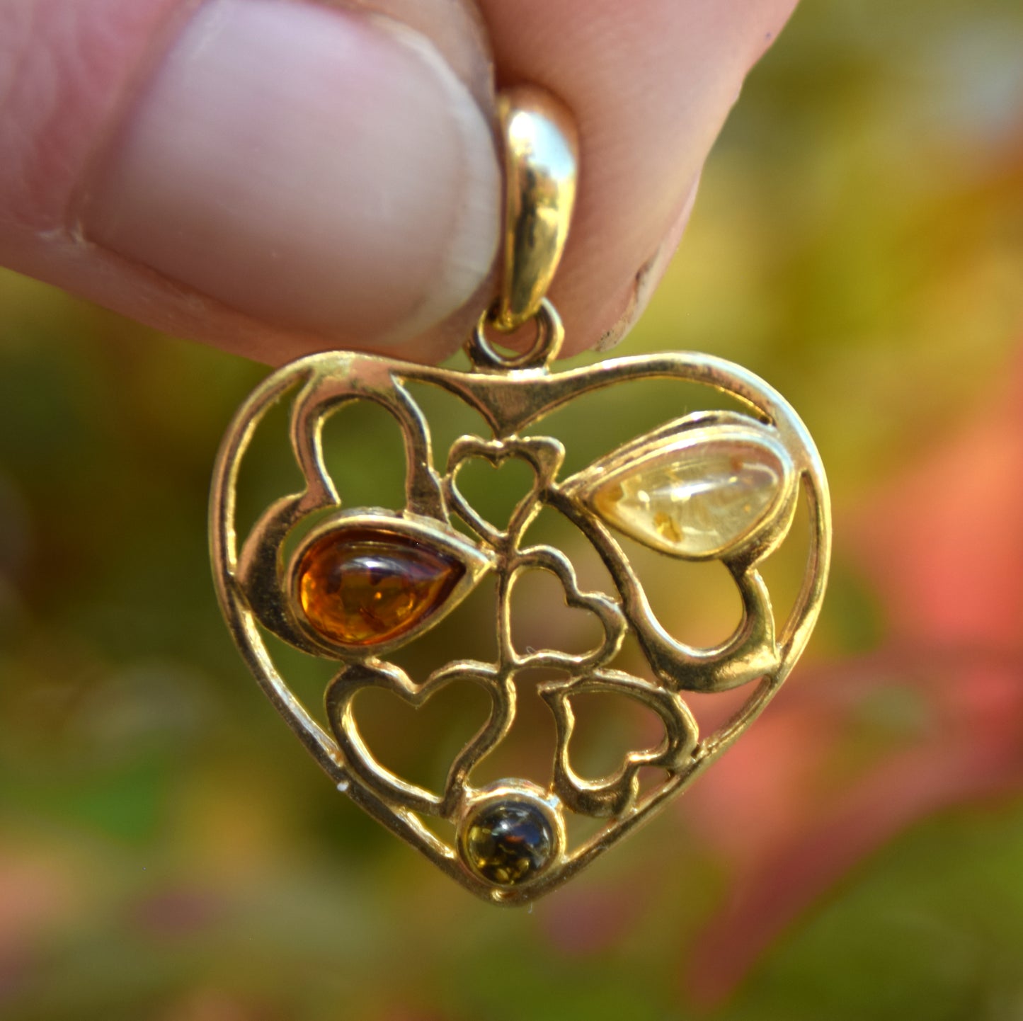 Romantic heart pendant in natural Amber of various shades and 18k Gold plated 925 Silver, MJ Baltica, BZW164