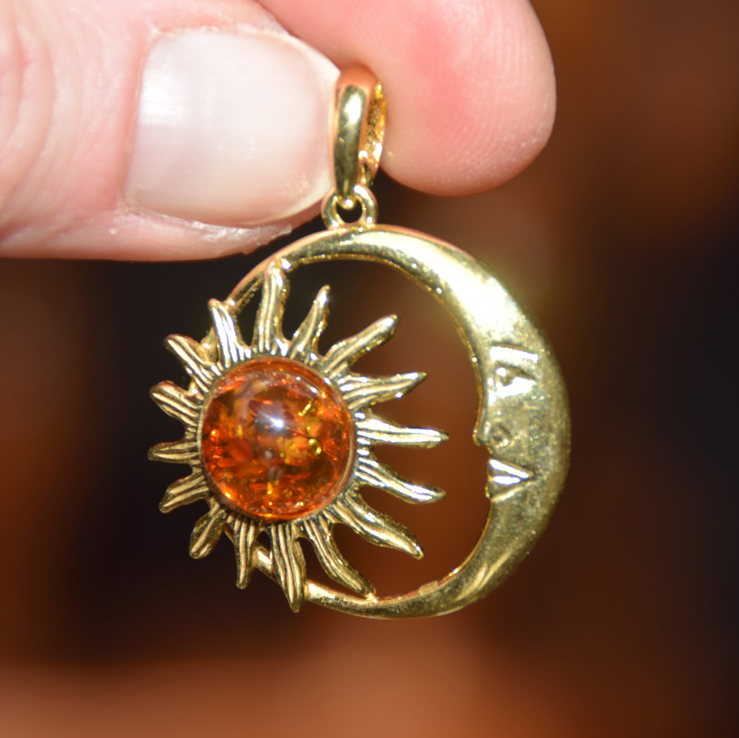 Sun and moon pendant with natural cognac-colored amber and 18k gold-plated silver, MJ Baltica, BZW183