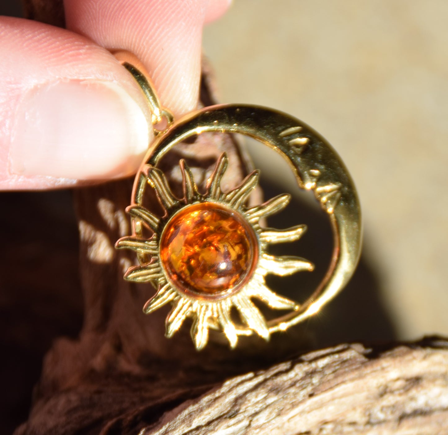 Sun and moon pendant with natural cognac-colored amber and 18k gold-plated silver, MJ Baltica, BZW183