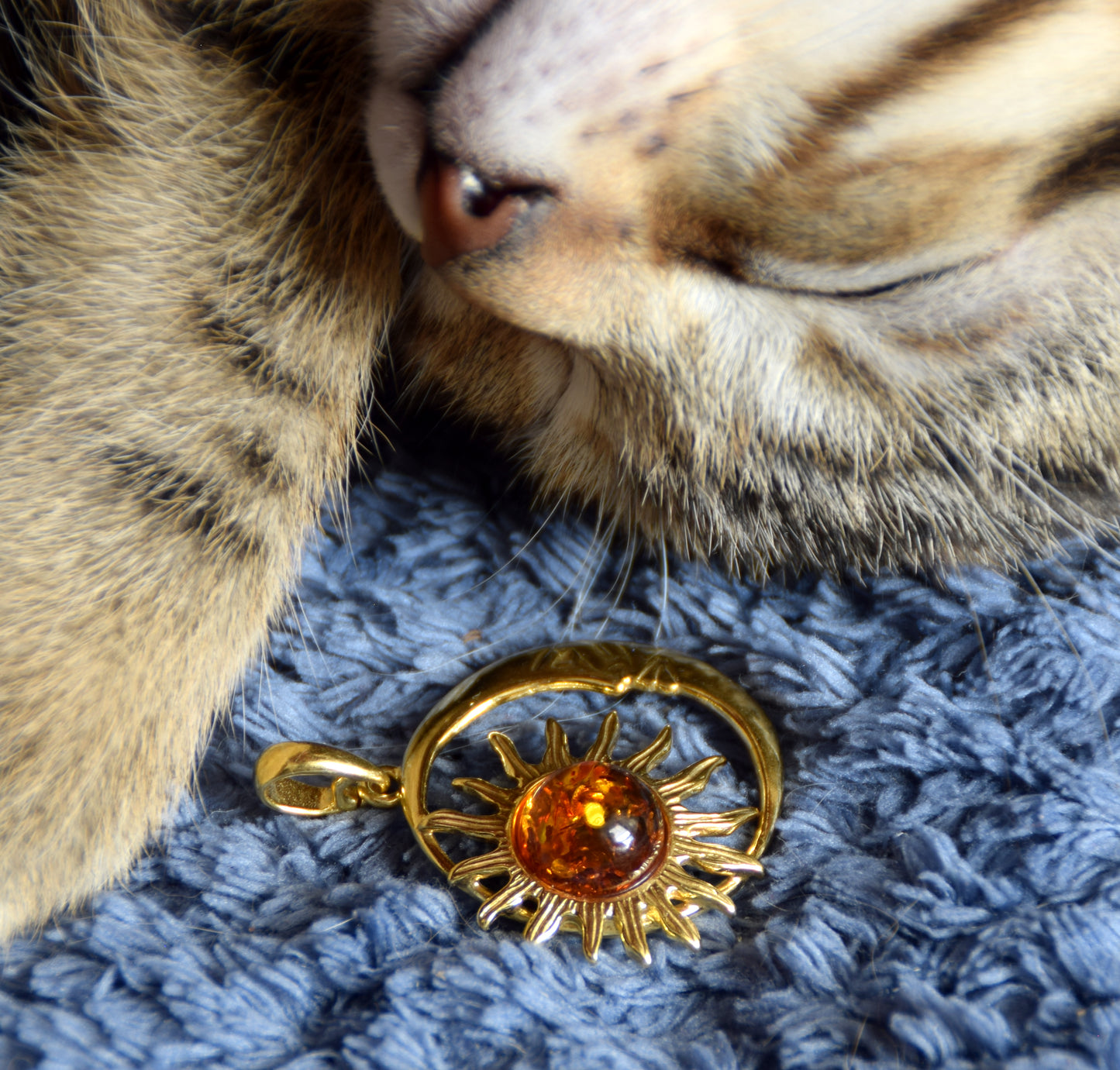 Sun and moon pendant with natural cognac-colored amber and 18k gold-plated silver, MJ Baltica, BZW183
