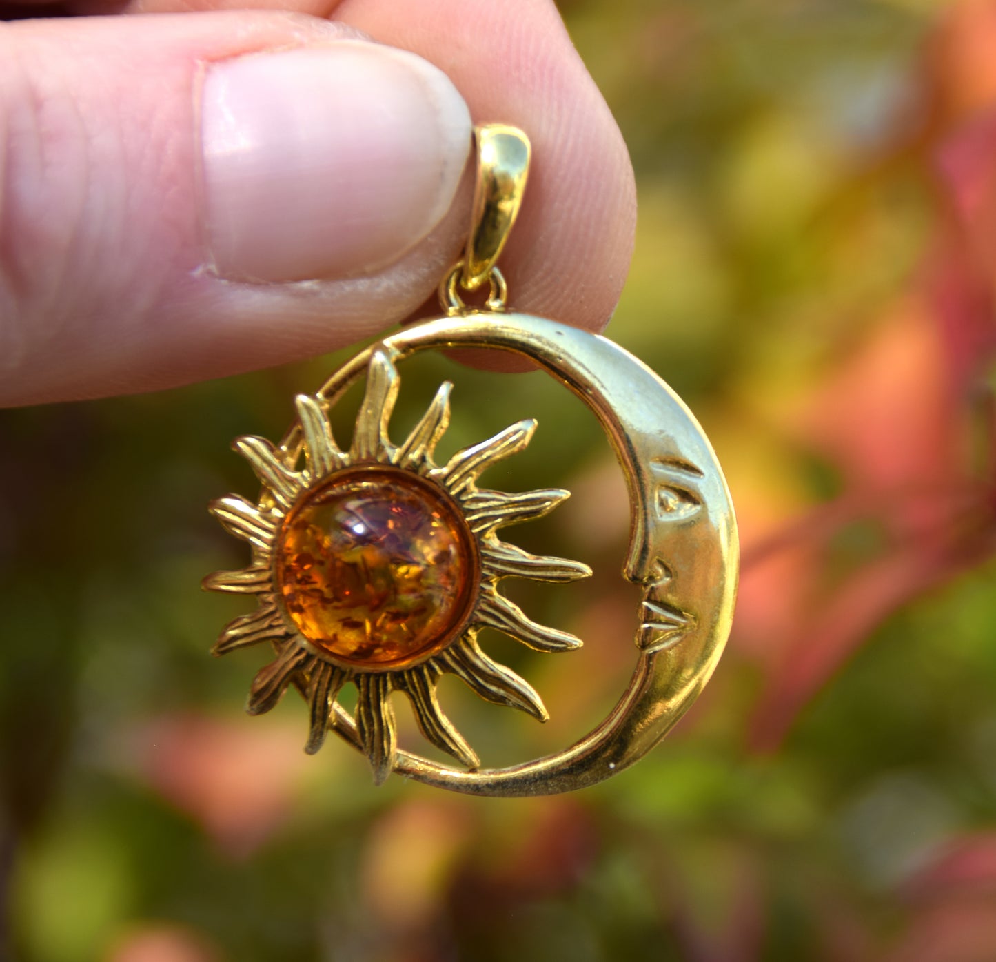 Sun and moon pendant with natural cognac-colored amber and 18k gold-plated silver, MJ Baltica, BZW183