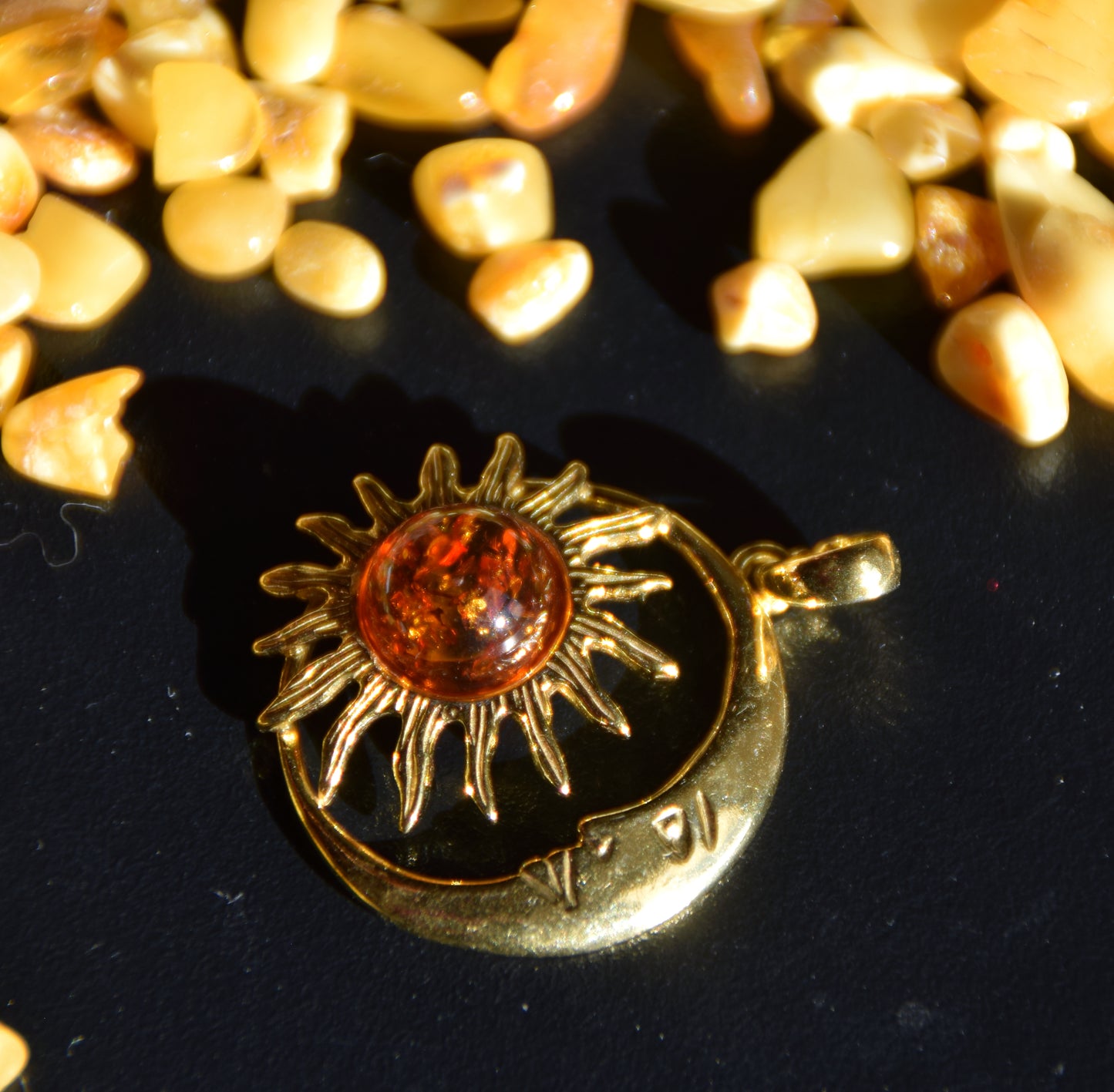 Sun and moon pendant with natural cognac-colored amber and 18k gold-plated silver, MJ Baltica, BZW183