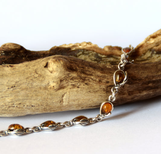Delicate vintage style bracelet with floral embellishment in natural cognac Amber and Sterling Silver 925, MJ Baltica, BB039