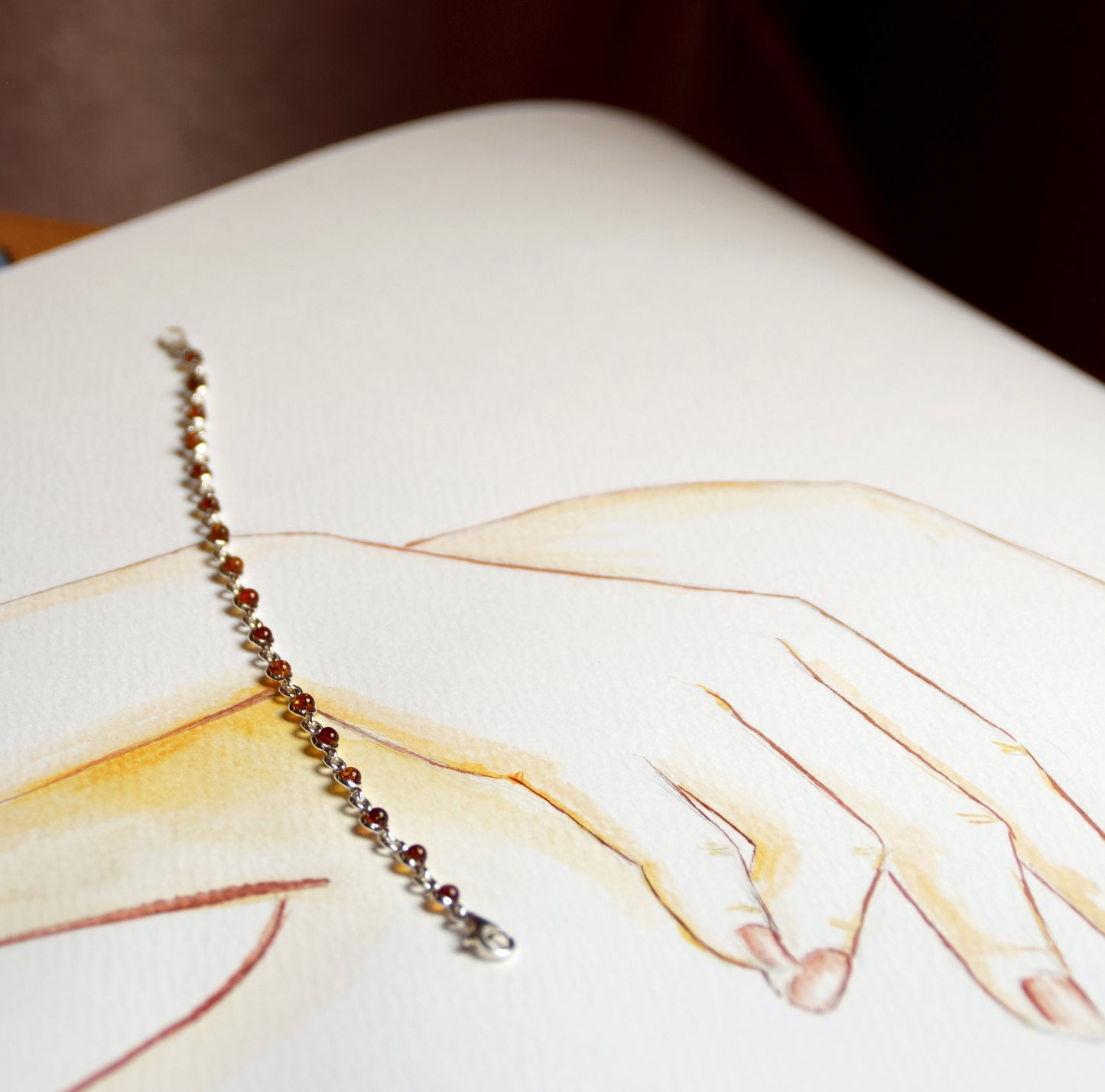 Delicate adjustable chain bracelet crafted with cognac-colored natural Amber and 925 Sterling Silver, MJ Baltica, BB014